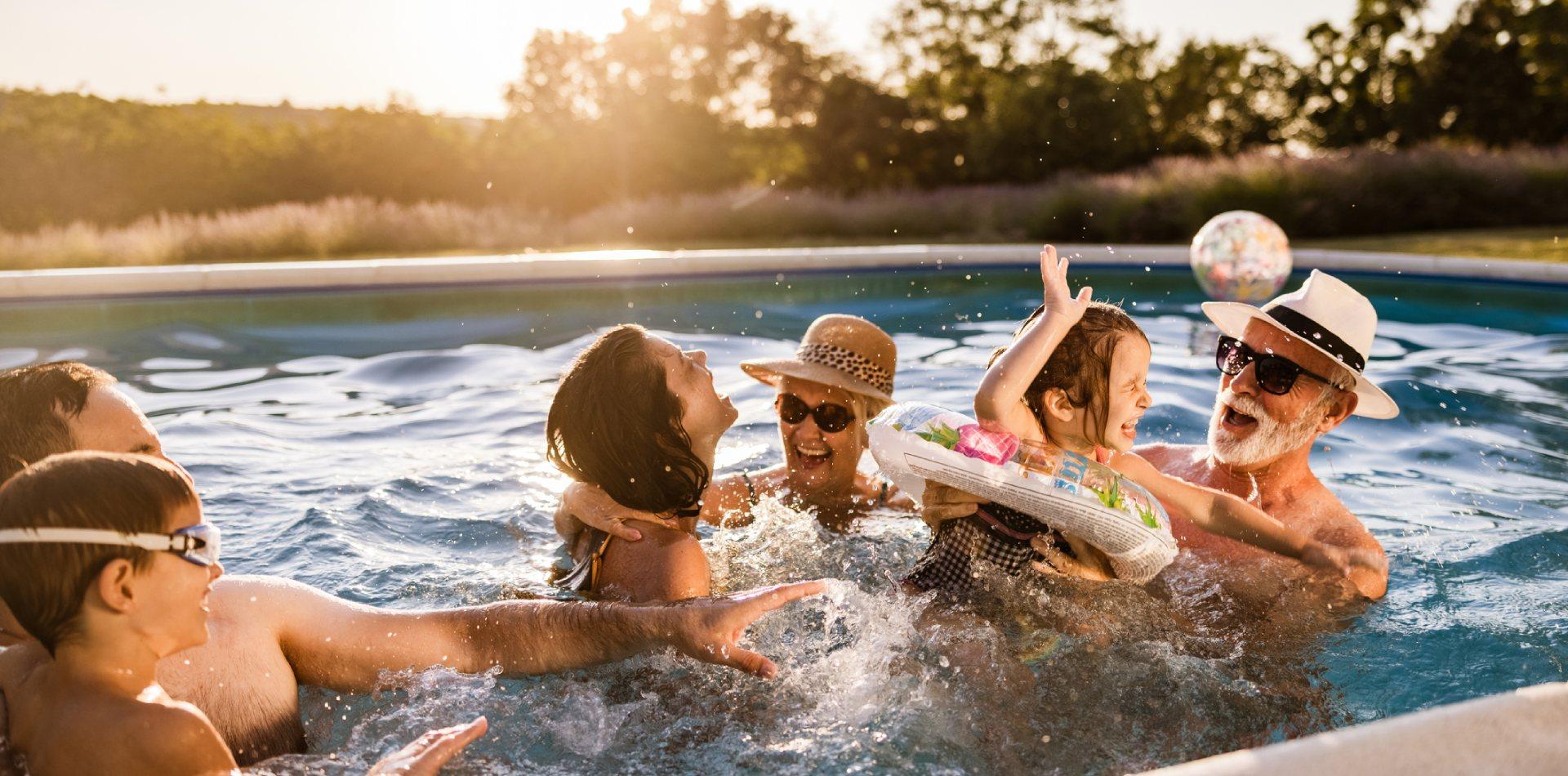 family having fun in the pool