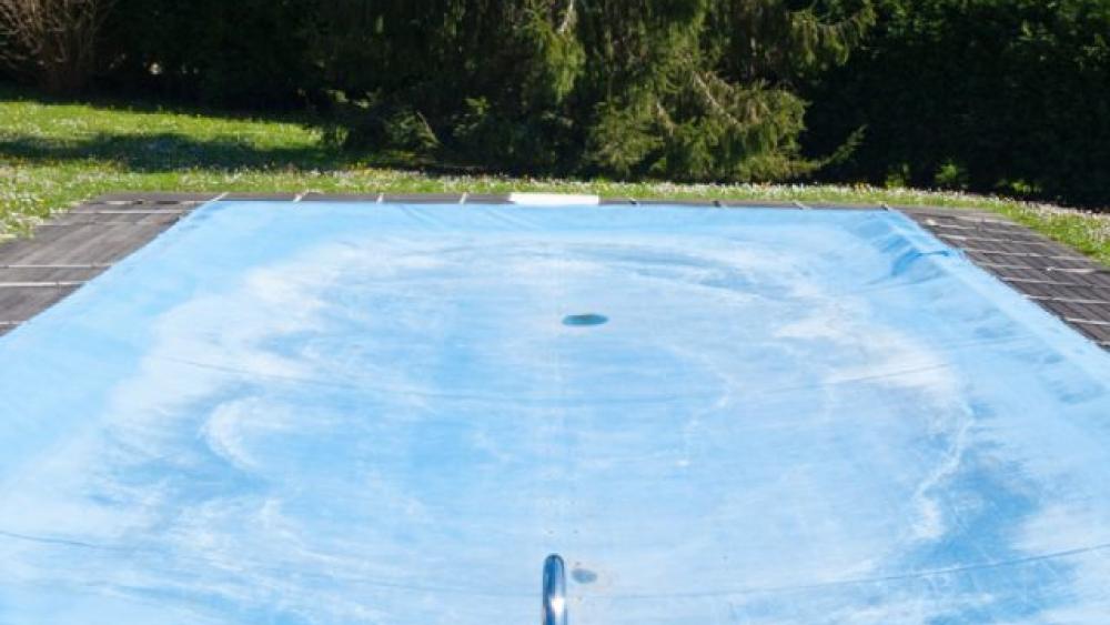 covered swimming pool in the spring